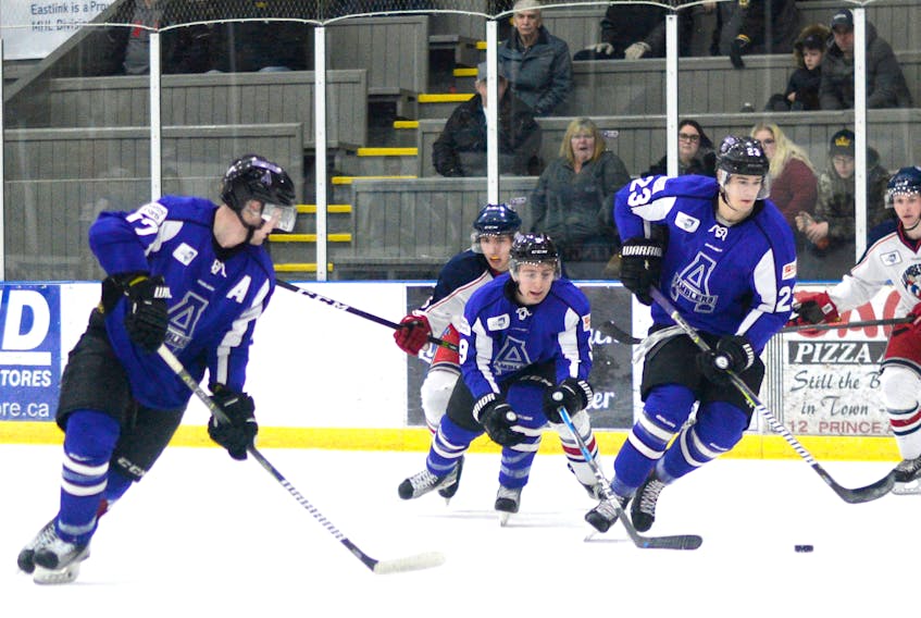 The Amherst Ramblers are home to host the St. Stephen Aces Saturday night at 7 p.m. Moving the puck up ice on this play is: (from left) Layton Parsons, Jacob Myra and Brady Griffin-Hefford.