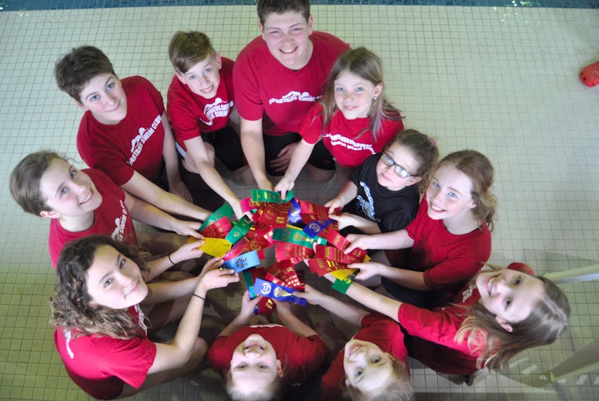 Spartans Swim Club members display the abundance of ribbons they recently earned at the Fast and Furious swim meet in Charlottetown. The swimmers are: (clockwise from bottom left) Lauren Millard, Olivia Bacon, Ella McGuigan, Simon Buske, Jordan Beaton, Ava Taggart, Gemma Leslie-Dowe, Abbie Byrnes, Reagan Bushen, Olivia Elliott, and Chelsea Elliott. Missing are Emmie Maddison and Aurelia Mitchell.
