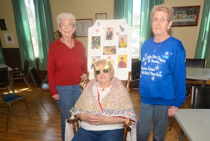 Elvis Presley, the King of Rock and Roll, will help keep the beat as Eleanor Harroun (centre) rocks in her rocking chair at the third annual Let’s Rock It Rock-a-thon Saturday from 1 to 4 p.m. at the Senior Citizen Recreation Centre in Springhill. Also participating in the Rock-a-thon is Marilyn Maddison (left) and Marj Brent. Harroun is the memorial secretary with the Springhill-Oxford Area Chapter of the Kidney Foundation, Maddison is past-president, and Brent is the chairperson.