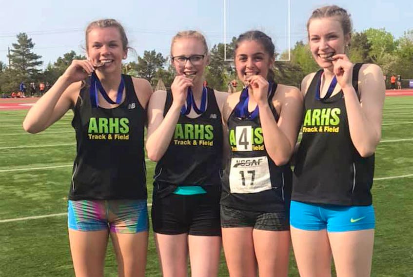 The Amherst Regional High School senior girls 4x400-metre relay team finished with bronze medals at the provincial championships with a time of 4:25.78. Enjoying their bronze medals are: (from left) Lauren Furlong, Juliana LeBlanc, Chloe Stubbert, and Olivia Scott.