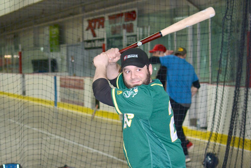Gus Tupper, seen here taking swings in the batting cage in Springhill, had two hits and scored twice in their 7-1 win over the Truro Bearcats.