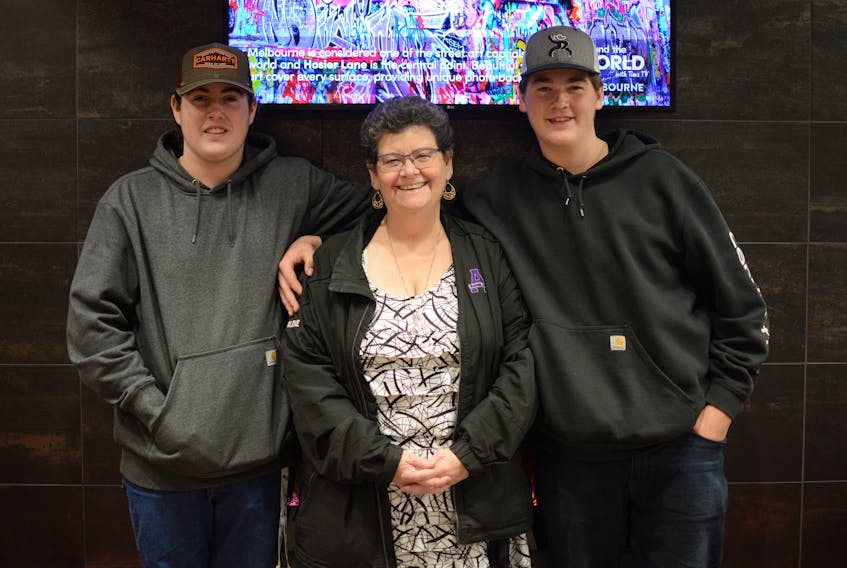 The Double D 4-H Club is hosting an open house on Sunday at 2 p.m. at the Brookdale Hall. Isaac Atkinson, left, Sharlene Carter-Earle, and Lynden Bacon have been members of the Double D 4-H club for most of their life, and they encourage others to join the club.