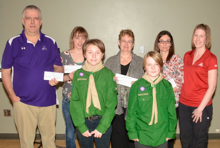 The Second Springhill Scout troop served a pancake brunch on Saturday, and afterwards the scouts were served donations from several local organizations. Those in attendance for the cheque presentations were: (front, from left) Scouts, 13-year-old Breanna Bradley and 10-year-old Hunter Scheltgen, (back, from left) Gary Brown, president of the Amherst CIBC Wood Gundy Ramblers; Tessa Reid, president of Local 4184 at High-Crest Springhill, Heather Henwood, president of NSGEU which represents LPN’s and RN’s at High-Crest Springhill; Theresa MacPhee, service support co-ordinator at High-Crest Springhill; and Melissa Scheltgen, group commissioner for the Second Springhill Scouts. The Ramblers donated two tents totaling $500, Reid and MacPhee donated $500 each on behalf of Local 4184 and the service support team at High-Crest Springhill, and Henwood donated $250 on behalf of NSGEU at High-Crest Springhill.