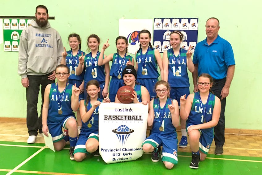 The Amherst A’s, a team that is part of the Amherst Minor Basketball Association, celebrate their gold medal win at the provincial championships last weekend. The Division 5 provincial champions are: (front, from left) Katherine McEachern, Sykora Hussey, Kristin Dupuis, Maddison Landry, Avery Bryan, (back, from left) assistant coach Leigh Johnson, Mataya Sangster, Cassidy Sangster, Hailey Johnson, Meagan Teed, Brooklyn Nicholson, and head coach Fred Gould.