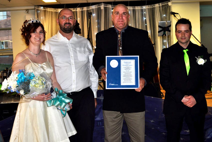 Andrea Deazley, Jim LeBlanc, Kevin St. Peter and Russ d’Orsay of Weston Bakeries accepted the Distinguished Service Award at the Cumberland Health Care Foundation’s Adult Prom on May 5.