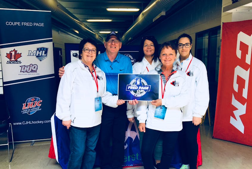 Bill Schurman of the Amherst Fred Page Cup 2019 host committee stands with members of the Ottawa host committee in front of the Amherst booth at the Jim Durrell complex. Schurman was part of the Amherst delegation that attended this year’s tournament last week in the nation’s capital.