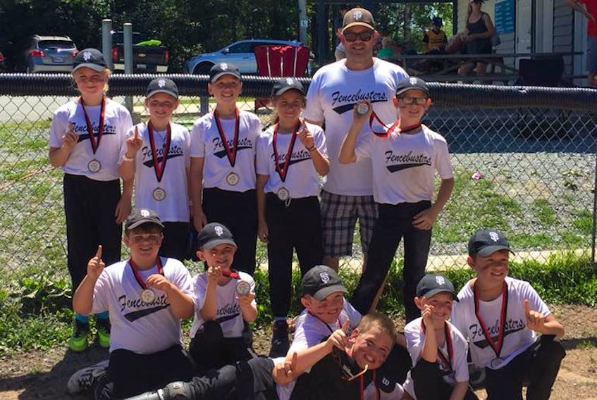 The Springhill Rookie Fencebusters won the silver medal at the Garfield Memorial Rookie Grand Slam Tournament in Fall River on Aug. 11. Members of the team include: (front) Logan MacDonald, (middle, from left) Cohen Lockhart, Brennan Reid, Keith Casey, Reed Reynolds, Lincoln MacDonald, (back, from left) Paige MacDonald, Emma Britten, Chase Varner, Julia Sharpe, Will Wood and coach Darren Lockhart. Missing are coaches Paul Sharpe, Mike Blue and Mike Brown and players Lucas Brown, Gavin Blue and Liam Theriault.