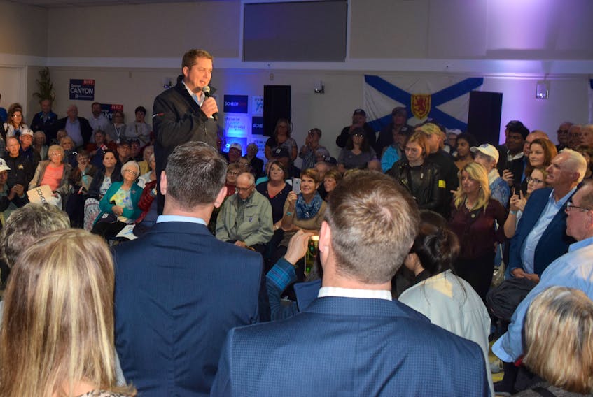 Conservative Leader Andrew Scheer speaks to a crowd at the Little Harbour Community Centre in Pictou County, where George Canyon is running as the Conservative candidate for Central Nova.