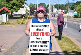 Annette Comeau was one of several protestors gathered on Willow Street Saturday to protest the Colchester East Hants Health Centre’s handling of a 22-year-old woman who was sent away with just two pamphlets on sexual assault after being raped last month. Protestors want support for sexual assault survivors to be funded by the province and made available in every hospital.