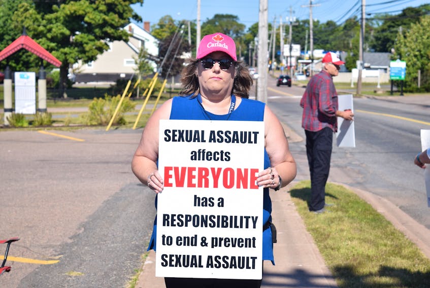 Annette Comeau was one of several protestors gathered on Willow Street Saturday to protest the Colchester East Hants Health Centre’s handling of a 22-year-old woman who was sent away with just two pamphlets on sexual assault after being raped last month. Protestors want support for sexual assault survivors to be funded by the province and made available in every hospital.
