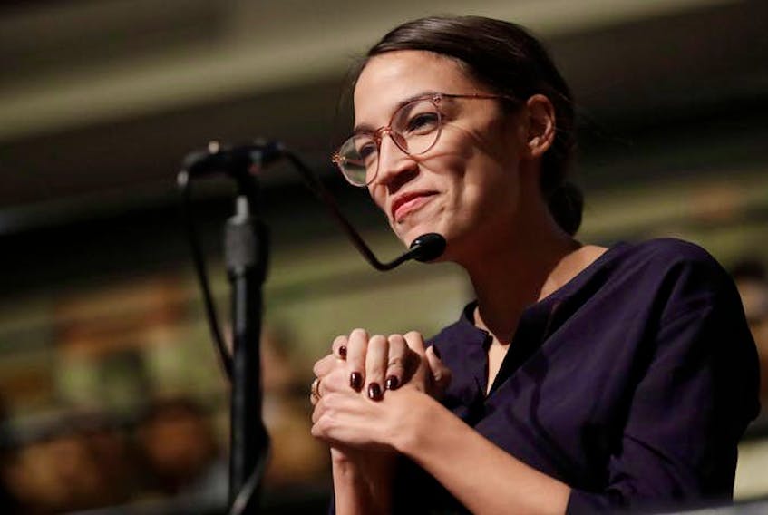 Democrat Alexandria Ocasio-Cortez, who won her bid for a seat in the House of Representatives in New York’s 14th Congressional District, asks 2014 Nobel Laureate Malala Yousafzai a question at the Kennedy School’s Institute of Politics at Harvard University in Cambridge, Mass. on Dec. 6, 2018. - AP Photo/Charles Krupa
