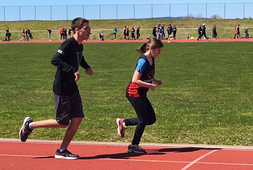 Amherst Regional High School Grade 12 para athlete Quentin Knock (left), shown in recent action at the NSSAF Northumberland regional track and field meet, has been fighting the Nova Scotia Schools Athletic Federation to have his points and those accumulated by para and special athletes included in their schools’ totals at the regional and provincial track and field championships.