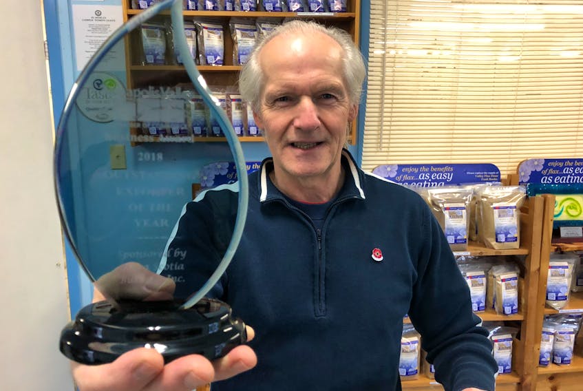 Valley Flax Flour Ltd. owner and general manager Howard Selig holds up the Annapolis Valley Chamber of Commerce’s Outstanding Exporter of the Year award that his Middleton company earned. The award was presented Nov. 1.