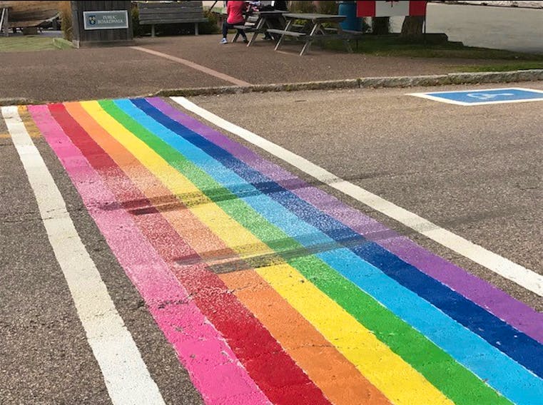 This newly painted rainbow crosswalk appears to have been deliberately vandalized in the wee hours of Saturday, Sept. 1. Police are looking for the driver of a dark green or blue van.
