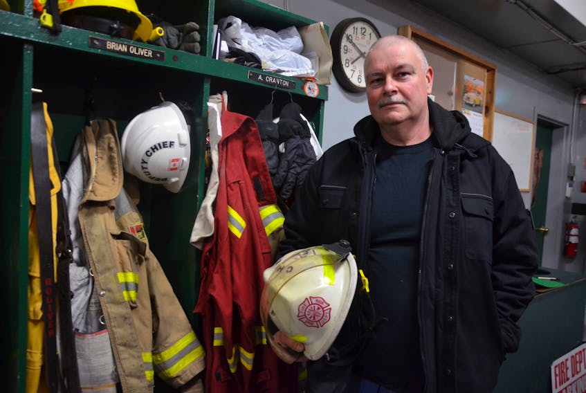 Andrew Cranton, the new chief at the Annapolis Royal Volunteer Fire Department don’s bunker gear like any other member, but the white helmet means he has to give direction and assume responsibility.