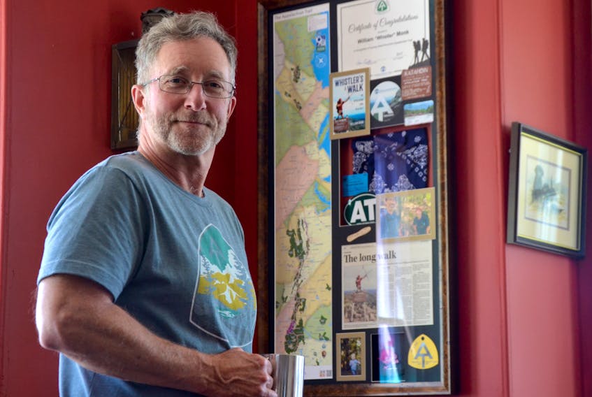 Bill Monk of Granville Ferry stands beside a collage of Appalachian Trail memorabilia created for him as a gift. Monk completed a through-hike of the trail in 2017 and wrote the book ‘Whistler’s Walk: The Appalachian Trail in 142 Days.’ On April 11 he starts the Pacific Crest Trail, 4,270 kilometres from Mexico to British Columbia.