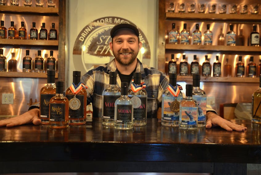 Andrew Cameron of Still Fired Distilleries in Lequille poses with three of the distillery’s products that won medals at the American Distilling Institute’s San Francisco Spirit Awards in 2017. This year those same products, plus several more, picked up medals at the inaugural Canadian Artisan Spirits Competition in British Columbia recently.