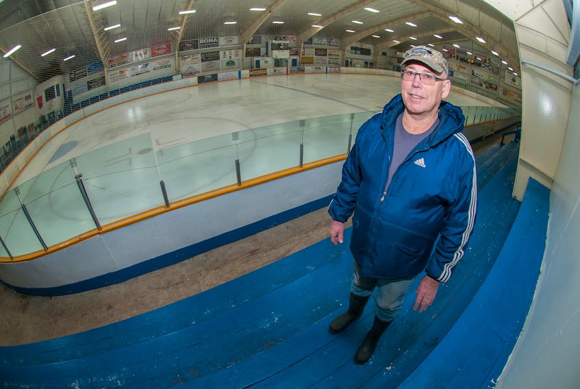 Steve Clayton stands in the Bridgetown & District Memorial Arena where numerous upgrades have made the facility more energy efficient and less expensive to operate.
