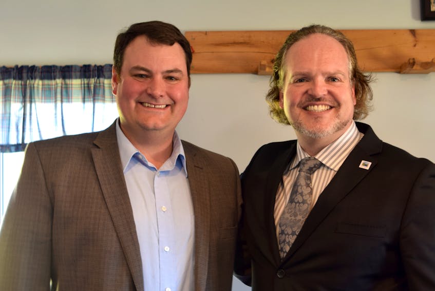 West Nova MP Colin Fraser, left, and Annapolis County Warden Timothy Habinski say a partnership between the county and the federal government will improve internet availability in the area.
