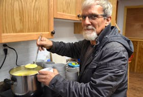 Round Hill businessman Roland Hamilton ladles out fish chowder at the Royal Canadian Legion in Bear River. He is a financial supporter of the new Bear River Community Kitchen. He vowed years ago that any success he had would be returned to the community.