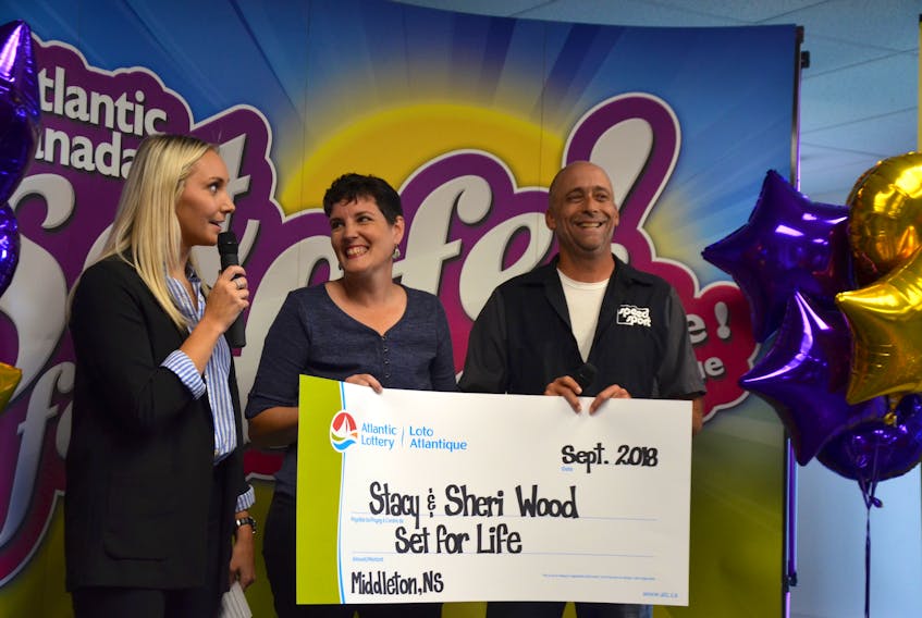 Sheri and Stacy Wood were handed a cheque for $675,000 in a ceremony in Greenwood Sept. 27. They won Atlantic Lottery’s Set for Life and opted for a lump sum instead of $1,000 a week for 25 years. They’re seen here with Atlantic Lottery’s Abby MacDonald.