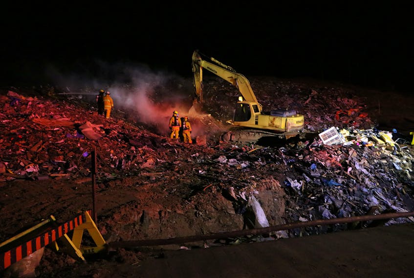 Firefighters battle a blaze at a C&D disposal site along Uhlman Branch Road in Torbrook West. It was reported at 1:18 a.m. on Friday morning. - Adrian Johnstone