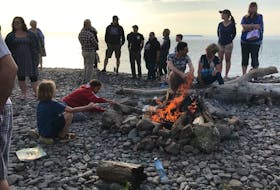 The community held a bonfire July 27 to show support to Mouhanad Abu Marzouk and his friends, who were confronted while praying on the beach in Harbourville recently.