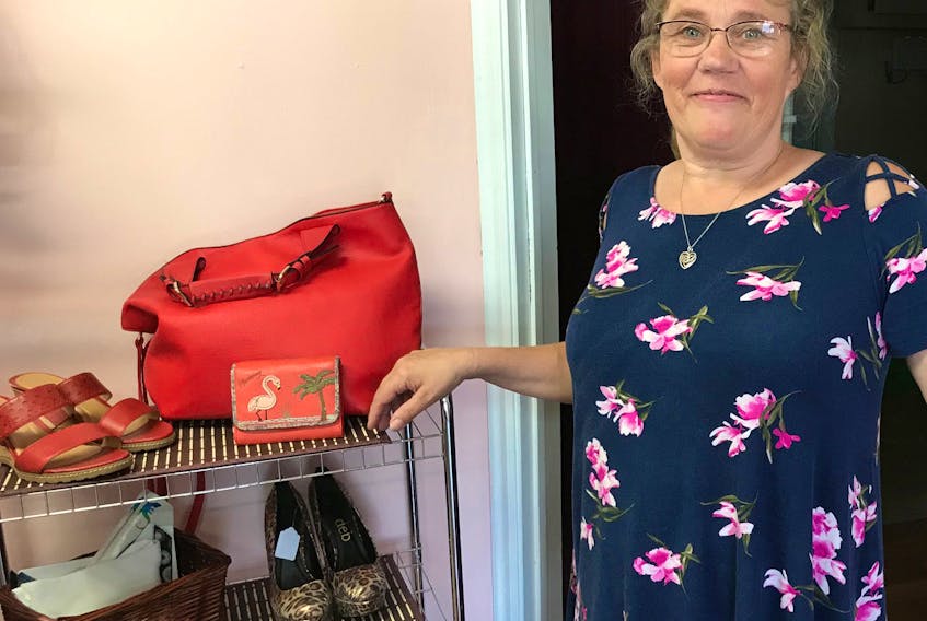 Rose Hurlburt opened the doors to Second Chance Boutique in early July. She offers a good selection of chic and affordable clothes for women of all sizes. - Heather Killen