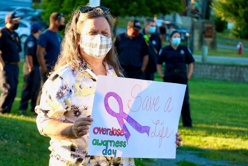 About 60 people gathered, wearing masks, in Windsor’s Victoria Park Aug. 31 to raise awareness of opioid overdoses and how naloxone can help save a life.