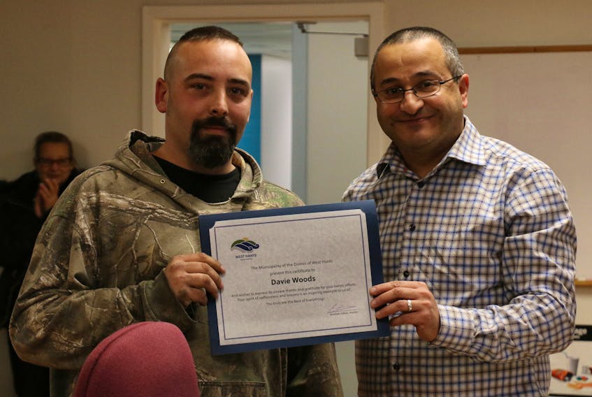 West Hants Warden Abraham Zebian, right, presented Davey Woods with a certificate of appreciation Nov. 26 after hearing how he helped rescue two children on Nov. 18.