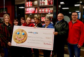 Members of the Windsor Senior Citizen Bus Society were delighted to receive the funds from Tim Hortons’ Smile Cookie campaign. Pictured here are, from left, Tara Cameron (Windsor Tim Hortons’ co-owner), Sue Sheehy, Jackie Haines, society chairwoman Leslie Porter, Ashley Langille-Wood (Windsor Tim Hortons’ co-owner), Cathy Illsley, Dave White, and Cory Walker (Windsor Tim Hortons’ general manager).