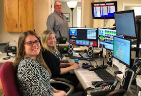 David Cunningham, Katie MacKay and Allison Ruggles all play a role in the emergency services support offered out Valley Communications in Kentville.