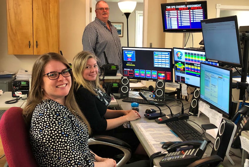 David Cunningham, Katie MacKay and Allison Ruggles all play a role in the emergency services support offered out Valley Communications in Kentville.