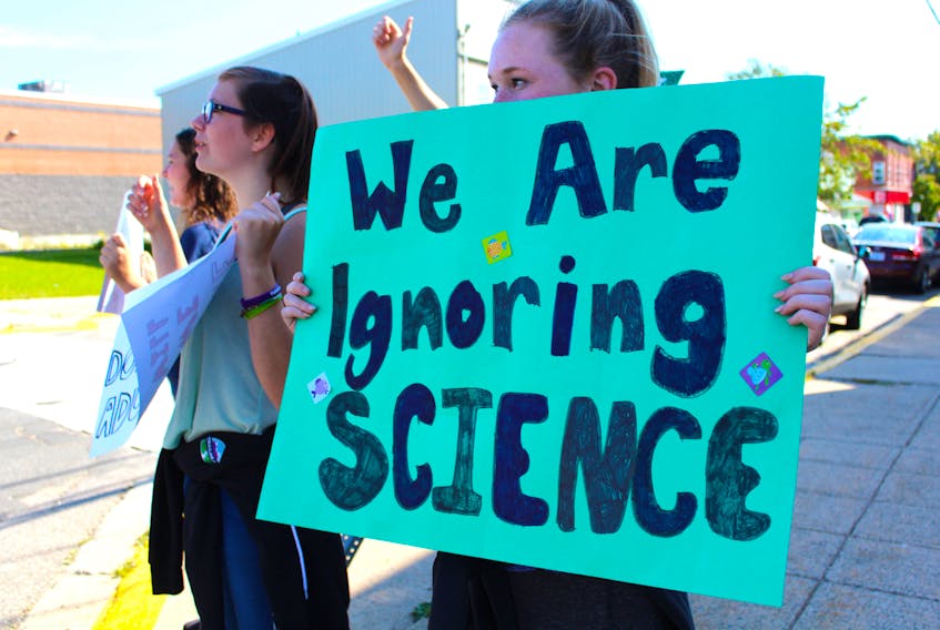 Climate activists base their belief that the climate is change on science. These Bridgetown Regional Community School students walked out Sept. 20 to demand action. JESSIE BRUCE