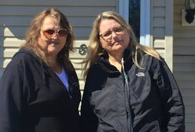 Twin sisters Koren Davidson, left, Karen Spencer have always been close. They’re leaning on each other now, more than ever before, as Spencer attempts to raise enough money to go to Toronto for a double lung transplant amid economic unrest caused by COVID-19.