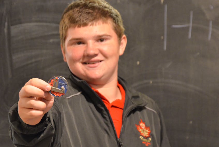 Ethen Rice, a former Bridgetown army cadet, holds a Vimy 1918 Armistice medal. In July he visited Europe through a cadet program that took him to Holland, France, and Belgium.