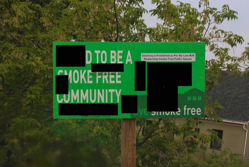 Vandals scrawled a racist term when they defaced Windsor’s Smoke Free sign by using the N-word. The culprits also drew unsavory images as well. (This image has been modified so as to not offend readers.)