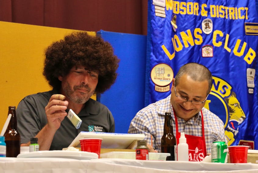 Lyle Crosby, channelling his inner Bob Ross, and Warden Abraham Zebian kept the paint-off fundraiser light-hearted and fun.