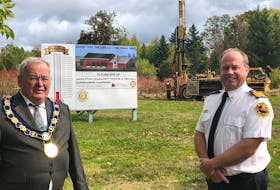 Mayor Sylvester Atkinson joins Mike Toole, the town’s fire chief, at the future site of the new Middleton Community Centre and Fire Hall complex. Some drilling was recently done at the site across from Town Hall on Commercial Street as part of a geotechnical study required to move the project forward.