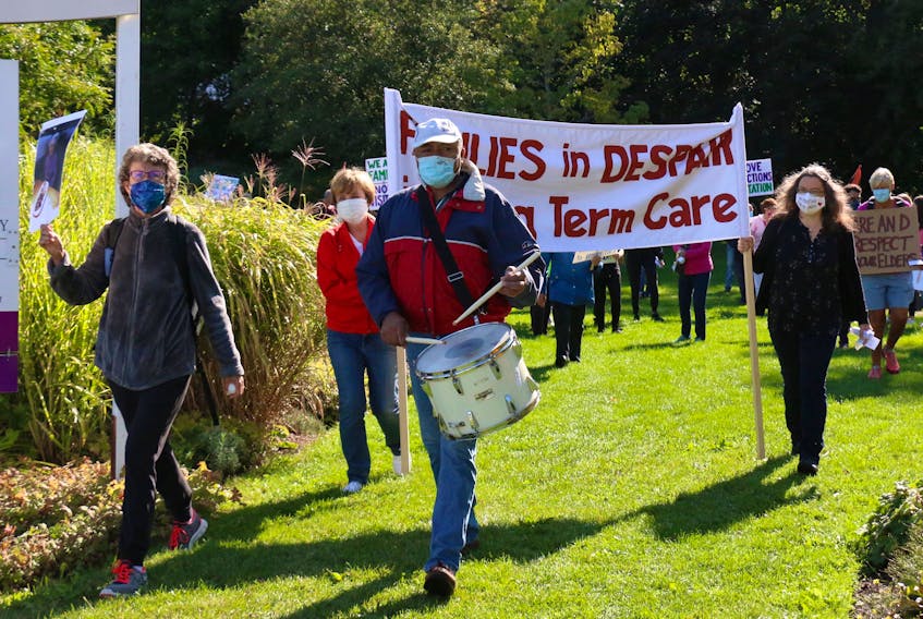 A few dozen people marched from Wolfville’s Willow Park up Main Street Sept. 12 as part of a long-term care rally.