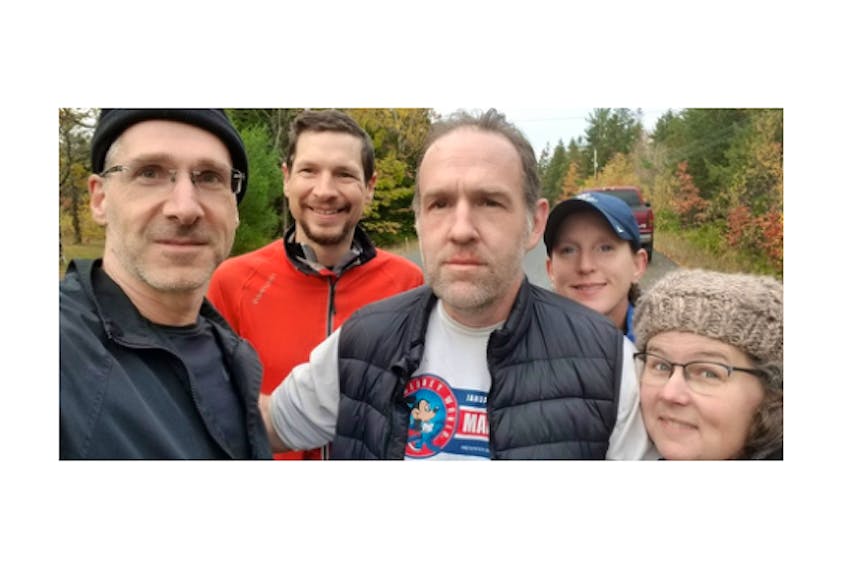 Supporters were by Andrew Friars’ side when he completed Lap 64 of the Everesting challenge on Oct. 19. Pictured are, from left, Andrew Postma, Adam Pearce, Friars, Misty Croney and Allison Friars. CONTRIBUTED