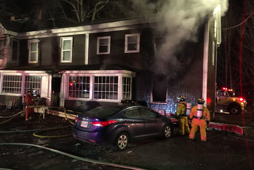 Firefighters worked quickly to knock down a fire at a multi-unit apartment in Waterville Dec. 6.
