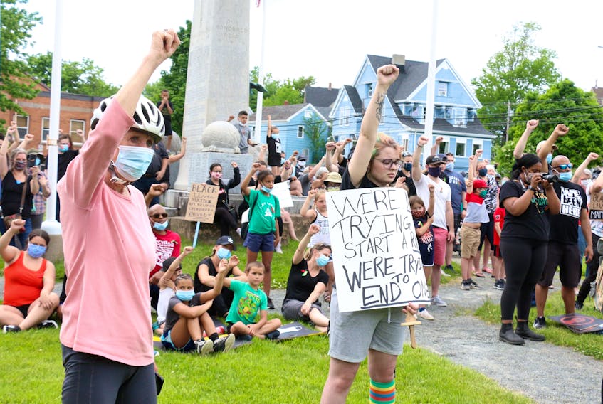 Hundreds of people converged on Victoria Park in Windsor to protest the systemic racism against people of colour June 13.