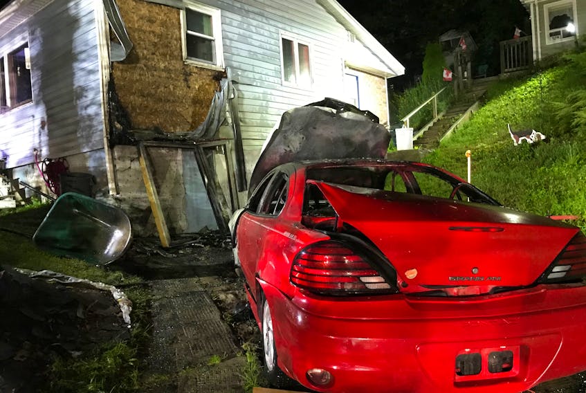 A car fire spread to a nearby home in the early morning hours of July 12, triggering a quick response from Wolfville and Greenwich firefighters.