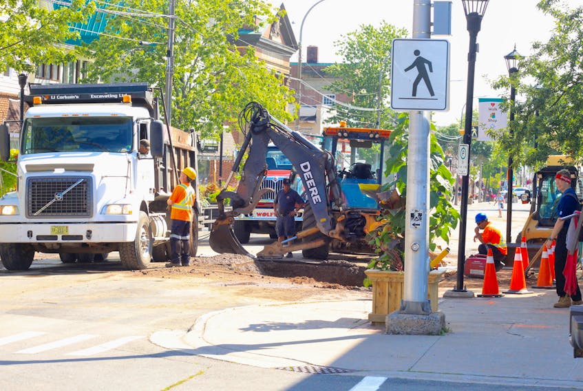 All hands were on deck the morning of Aug. 7 as crews worked to repair the damage done by a water main break that occurred along Main Street in Wolfville the previous evening.