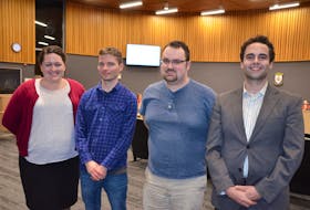 County of Kings policy analyst Vicki Brooke with Dalhousie University Management Without Borders students Luke Van Horne, Sam Mahoney-Volk and Jean-Luc Lemieux following a presentation to council on a voter outreach and engagement strategy.