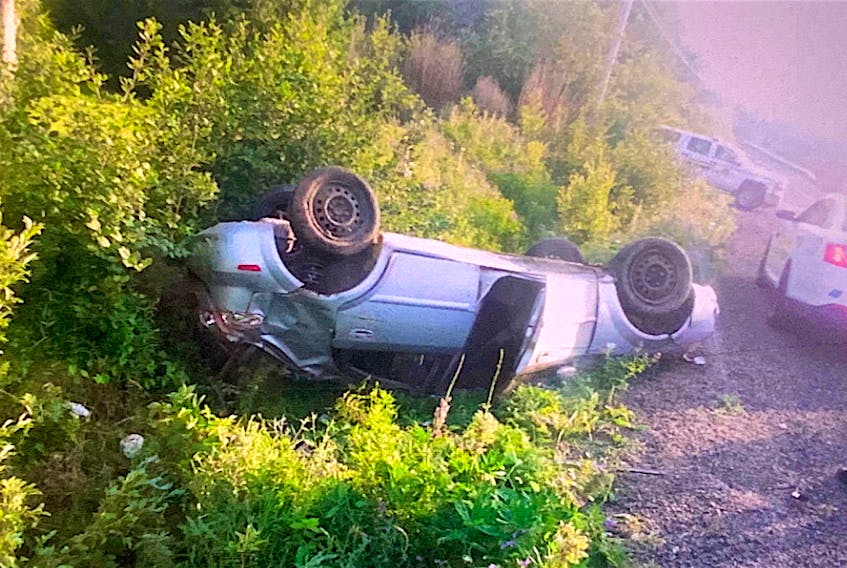 This car ended up in the ditch on its roof after an incident in Litchfield July 16 at supper time. The crash also involved a white SUV that fled the scene. The mother of the woman driving the car says her daughter was forced off the road. The SUV was later found and a man has been charged with assault with a weapon and dangerous driving.