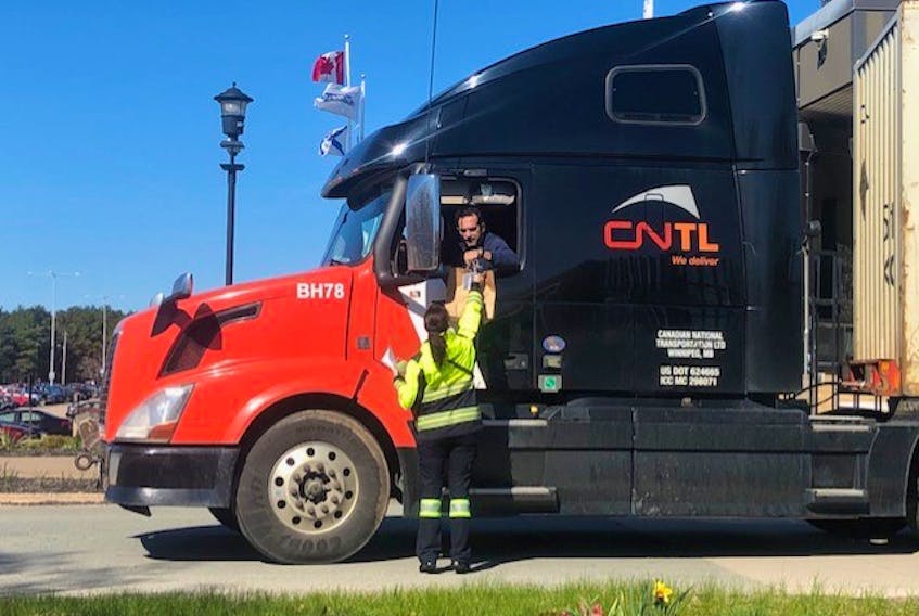 A truck driver leaving the Michelin plant in Waterville recently is treated to a free lunch before heading out on the road to continue providing an essential service during the COVID-19 pandemic.