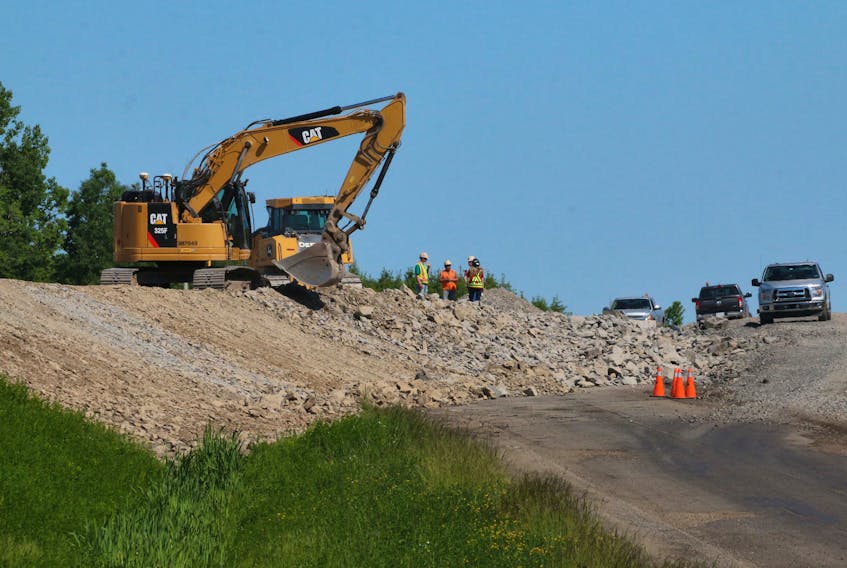 As temperatures soared to 30C June 19, construction crews were still working on the Highway 101 twinning project near Windsor.