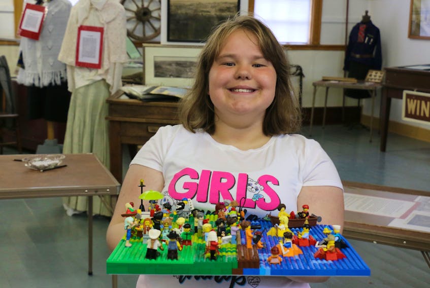 Ten-year-old Lilly Mailman shows off her first place LEGO creation. It will remain on display at the West Hants Historical Society until the end of the month.